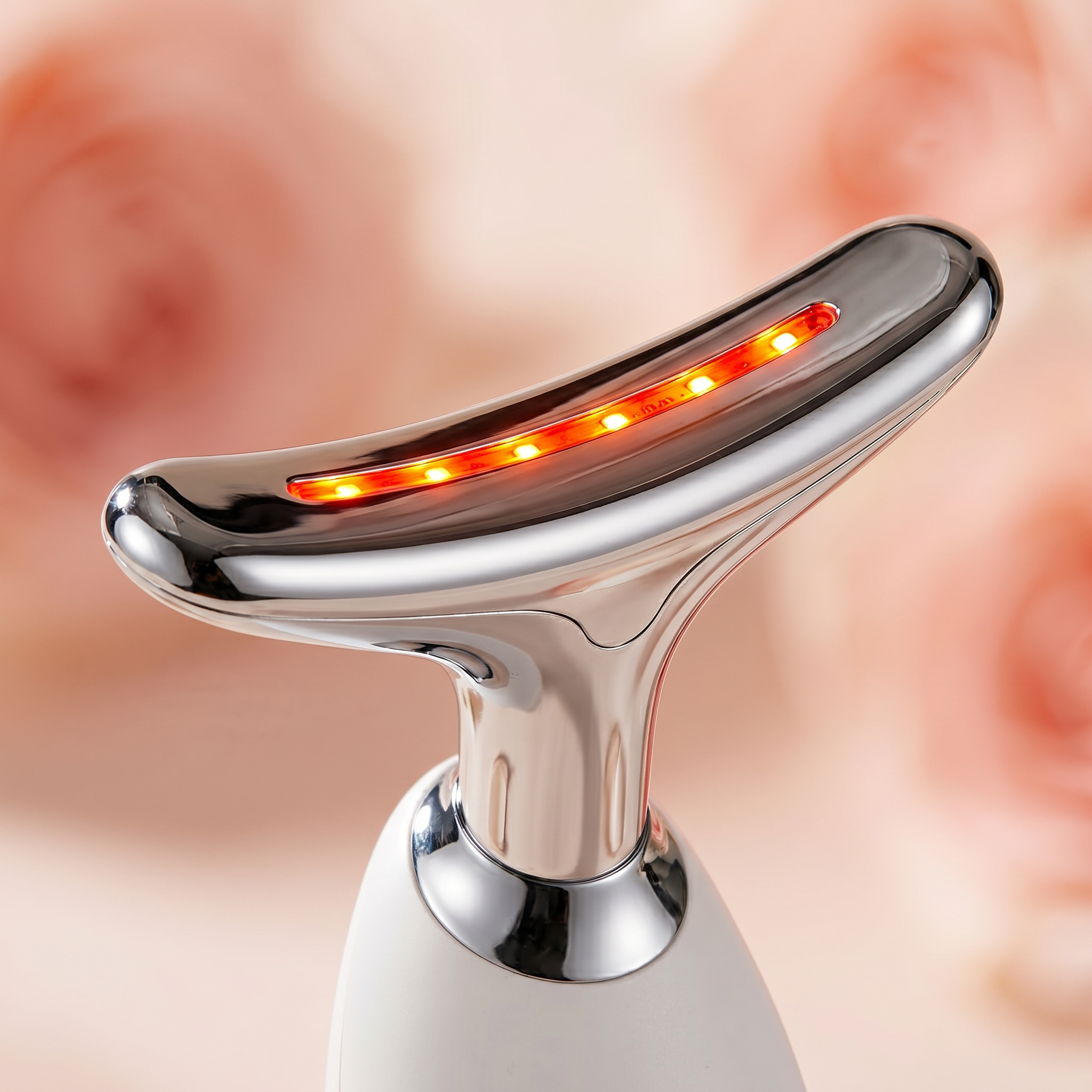 The Opalé Sculptor - Face Scultping Device with a reddish background